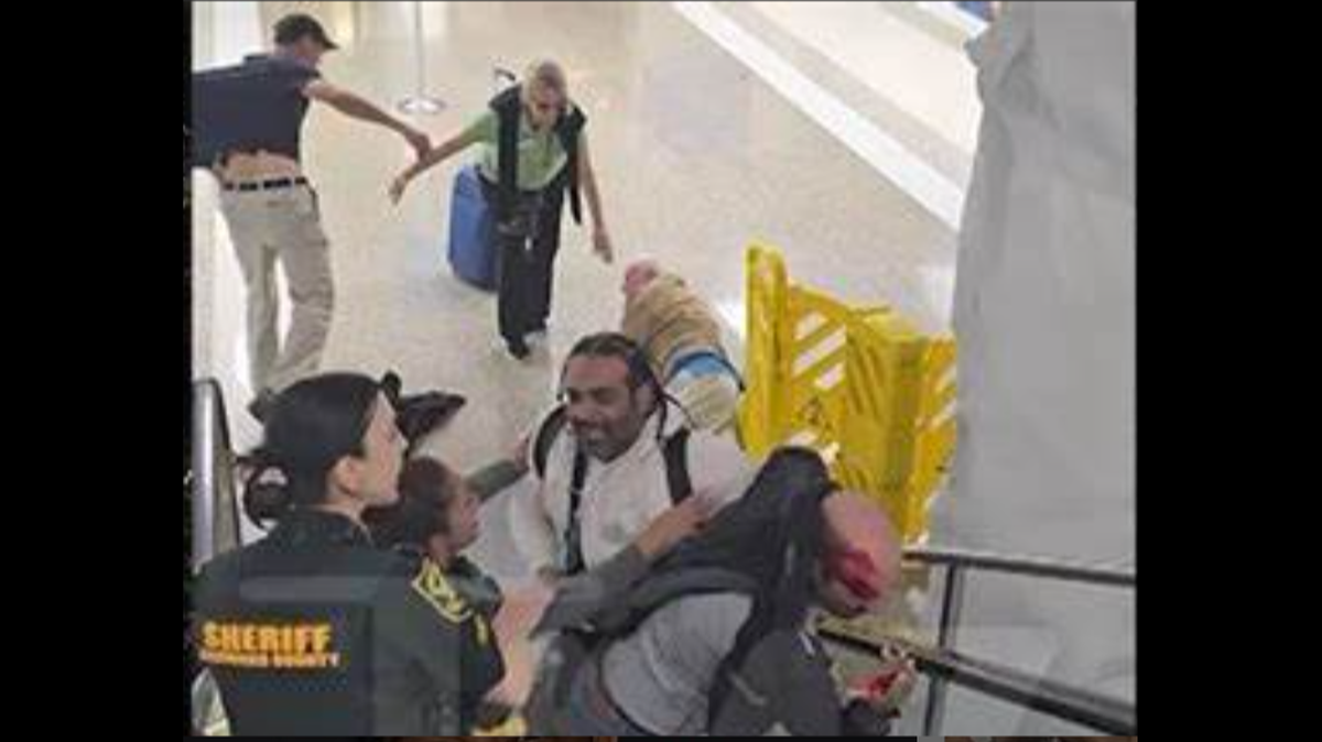 Screenshot of viral video of Jim Jones fighting at FLL/Twitter