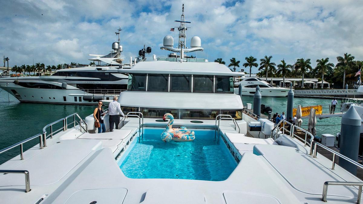 At the Miami International Boat Show, check out crafts like The Thunder yacht, which was docked at Island Gardens Marina during the 2022 boat show.