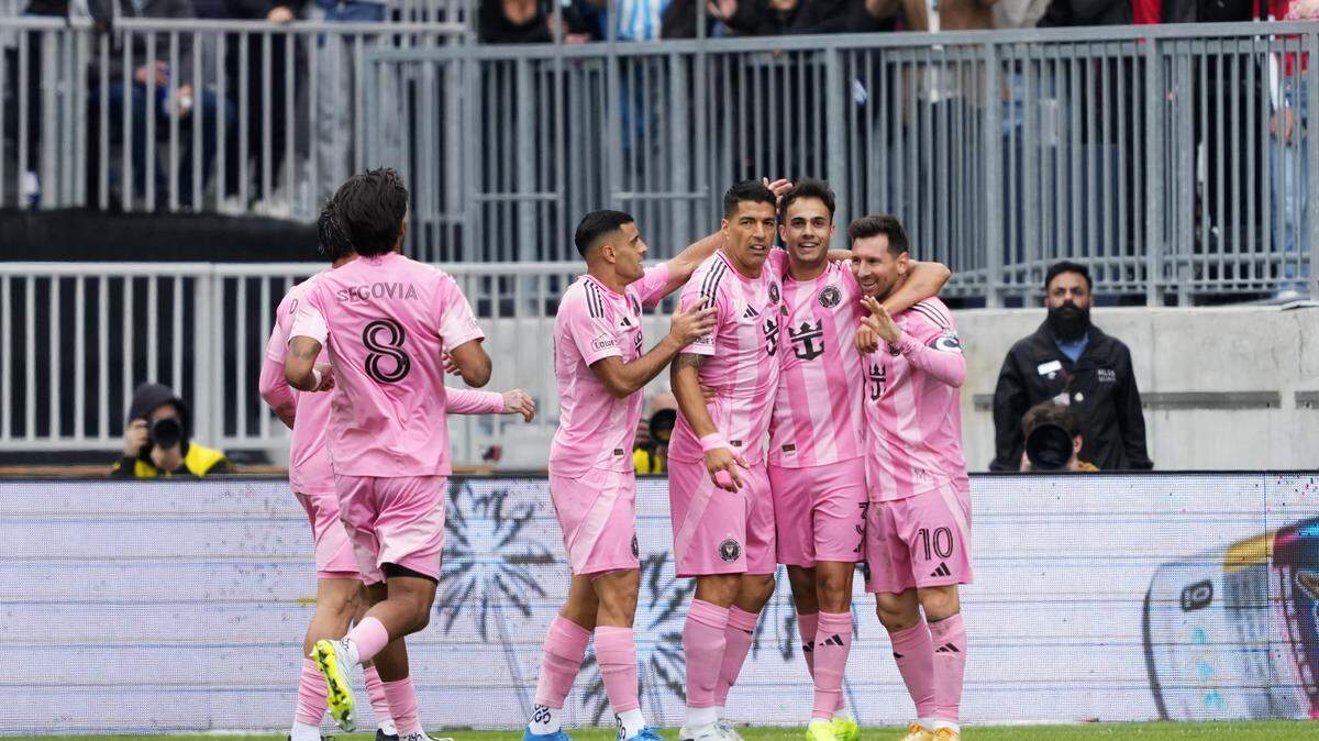 TORONTO, ONTARIO - MAY 09: Sergio Reguilon #3 of Inter Miami CF celebrates scoring his team's third goal with teammates Lionel Messi #10 and Luis Suárez #9 during the MLS match between Toronto FC and Inter Miami CF at BMO Field on May 09, 2026 in Toronto, Ontario. (Photo by Mark Blinch/Getty Images)