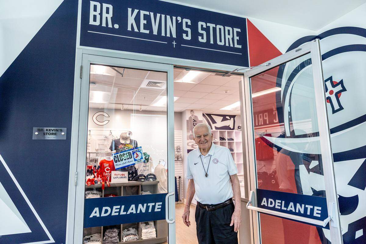 Brother Kevin Handibode walks out of a school merchandise store in his namesake at Christopher Columbus High School on Friday, May 22, 2026 in Miami, Fla.