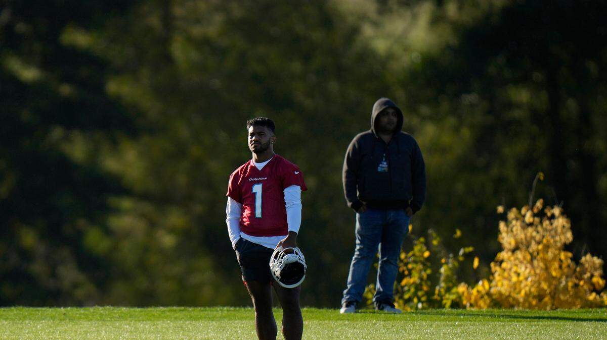 Dolphins quarterback Tua Tagovailoa waits to take part in a practice and media availability by the Miami Dolphins In Ware, England, Friday, Oct. 15, 2021. The Dolphins play the Jaguars in a regular season NFL game on Sunday at Tottenham Hotspurs White Hart Lane stadium in London.