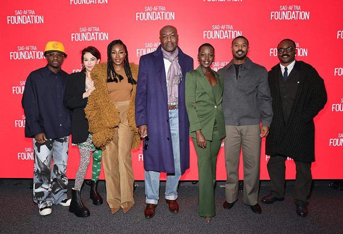 NEW YORK, NEW YORK - DECEMBER 01:  Miles Canton, Francine Maisler, Jayme Lawson, Delroy Lindo, Lupita Nyong'o, Michael B. Jordan and Ryan Coogler attend SAG-AFTRA Foundation Conversations: "Sinners" at SAG-AFTRA Foundation Robin Williams Center on December 01, 2025 in New York City.  (Photo by Theo Wargo/Getty Images)