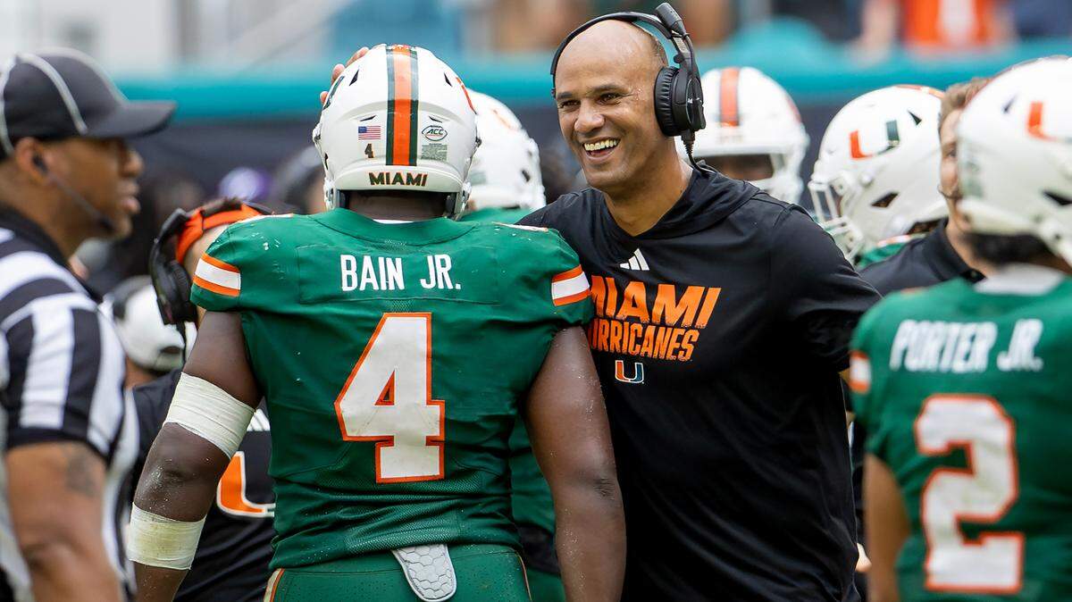 Miami Hurricanes defensive line coach Jason Taylor Hurricanes defensive lineman Rueben Bain Jr. (4) pressures Duke Blue Devils quarterback Maalik Murphy (6) during the second half of an ACC football game at Hard Rock Stadium on Saturday, Nov. 2, 2024, in Miami Gardens, Fla.