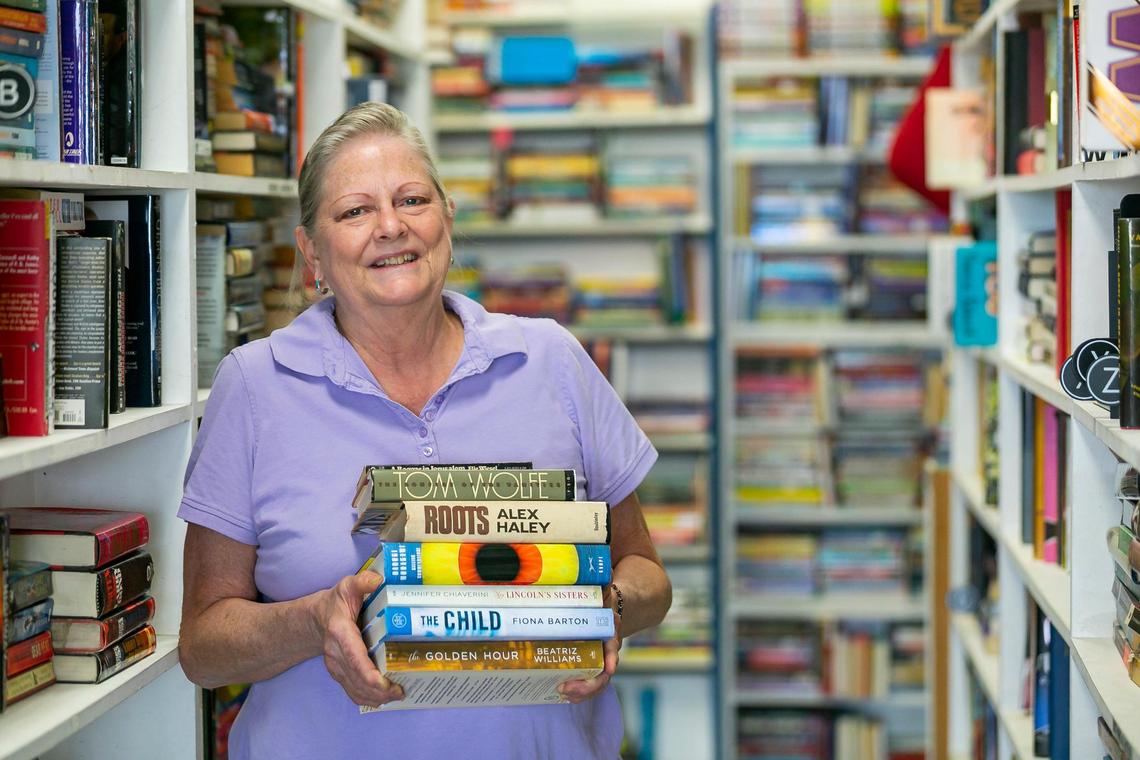 Eunice Rodriguez, the owner of the Kendall Book Exchange used bookstore and the apothecary Tea ‘N Sanity, works from her store in South Kendall at 15420 SW 136th St. in South Kendall on Saturday, May 8, 2021.