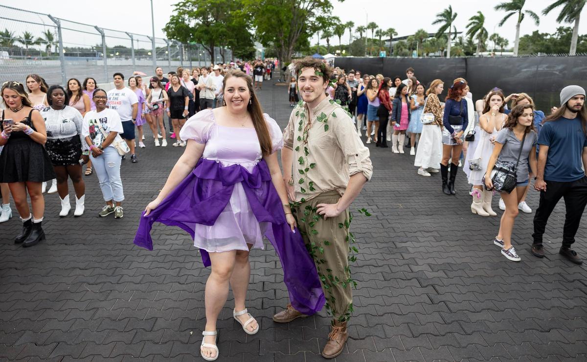 Elizabeth Broadwater, left, and Jenner Wilt are photographed as they arrive to Hard Rock Stadium to watch Taylor Swift’s The Eras Tour on Friday, Oct.18, 2024, in Miami Gardens, Fla.