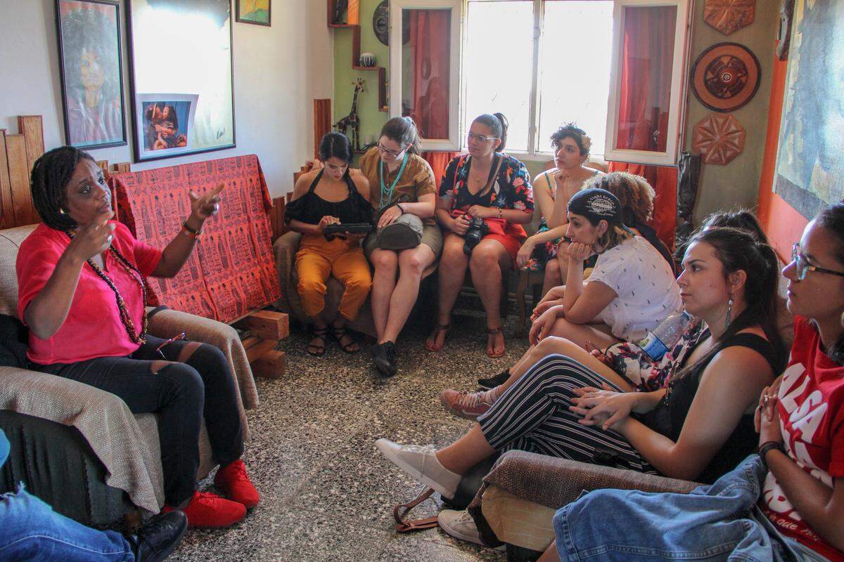Women on a CubaOne Foundation trip to Cuba have a discussion on race in Regla, one of the hardest hit neighborhoods, just a few days before the tornado struck.
