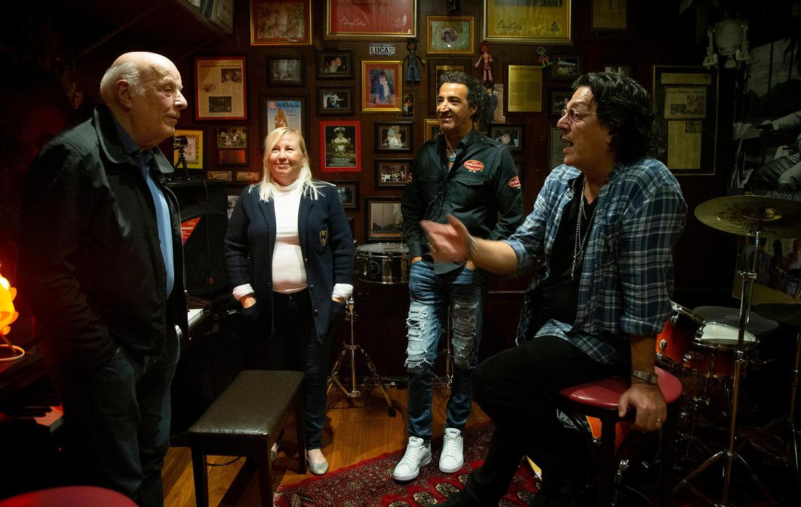Owner Gerardo Cea (second from right) hangs out with Grammy award-winning songwriter and producer Rudy Prez (far right), his wife Betsy and Hall of Fame songwriter Charles Fox in Cea’s private studio inside Cafe Prima Pasta.