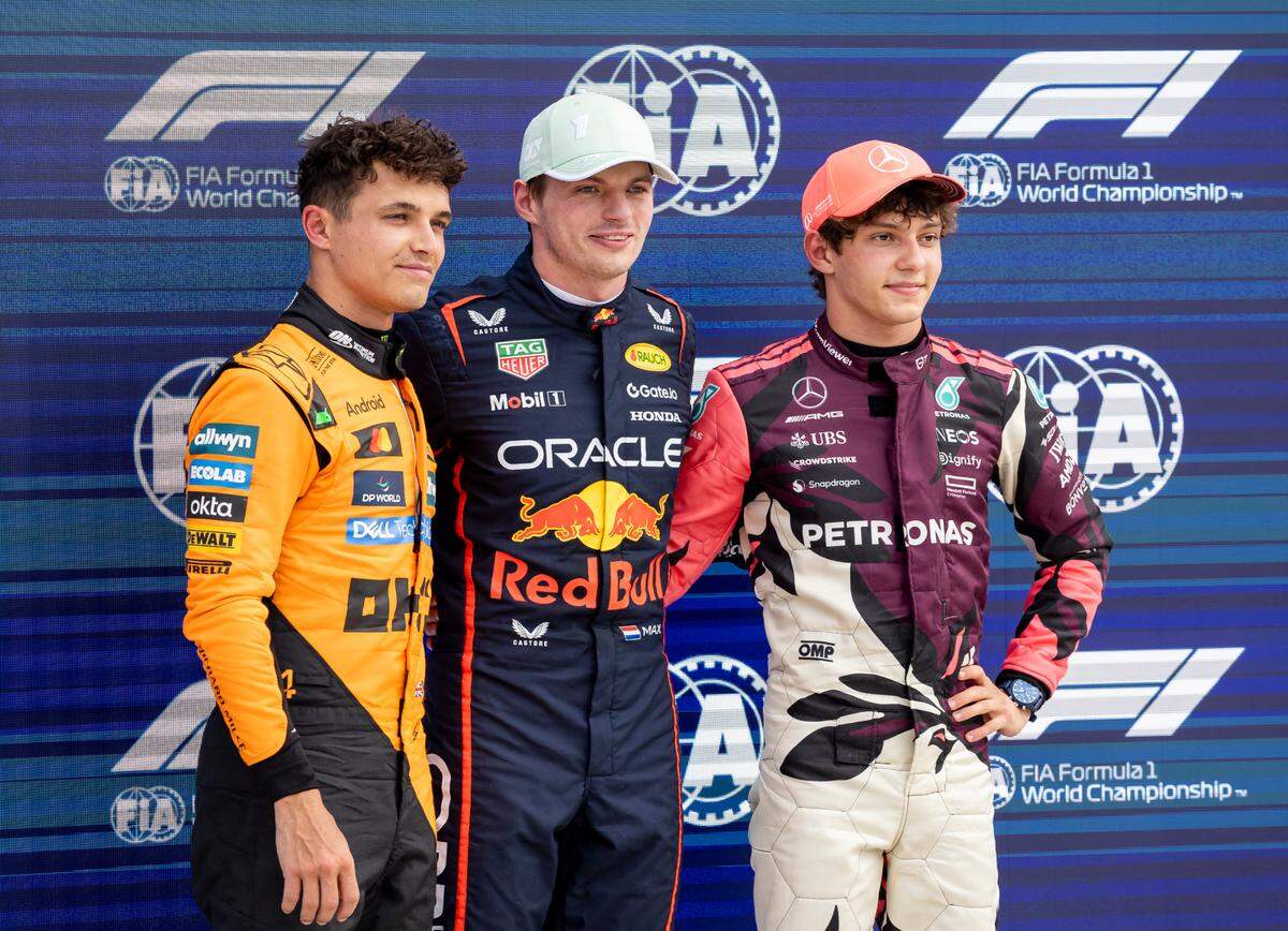 Red Bull Racing driver Max Verstappen of Netherlands, McLaren driver Lando Norris of Britain and Mercedes driver Andrea Kimi Antonelli of Italy gather for a photo after they participated in a Race Qualifying session on the second day of the Formula One Miami Grand Prix at the Miami International Autodrome on Saturday, May 3, 2025, in Miami Gardens, Fla.