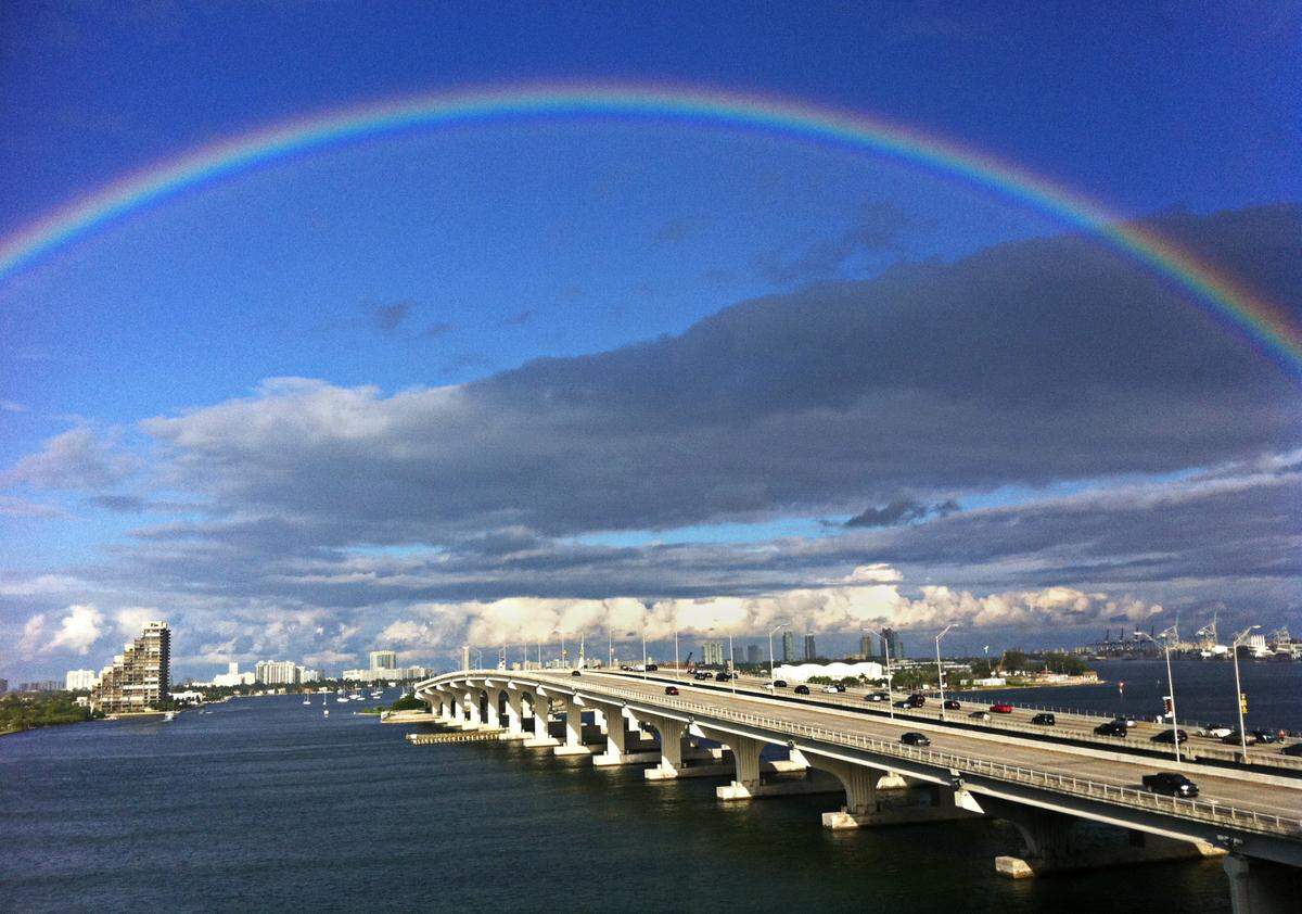 A vivid rainbow shines over the MacArthur Causeway 2010.
