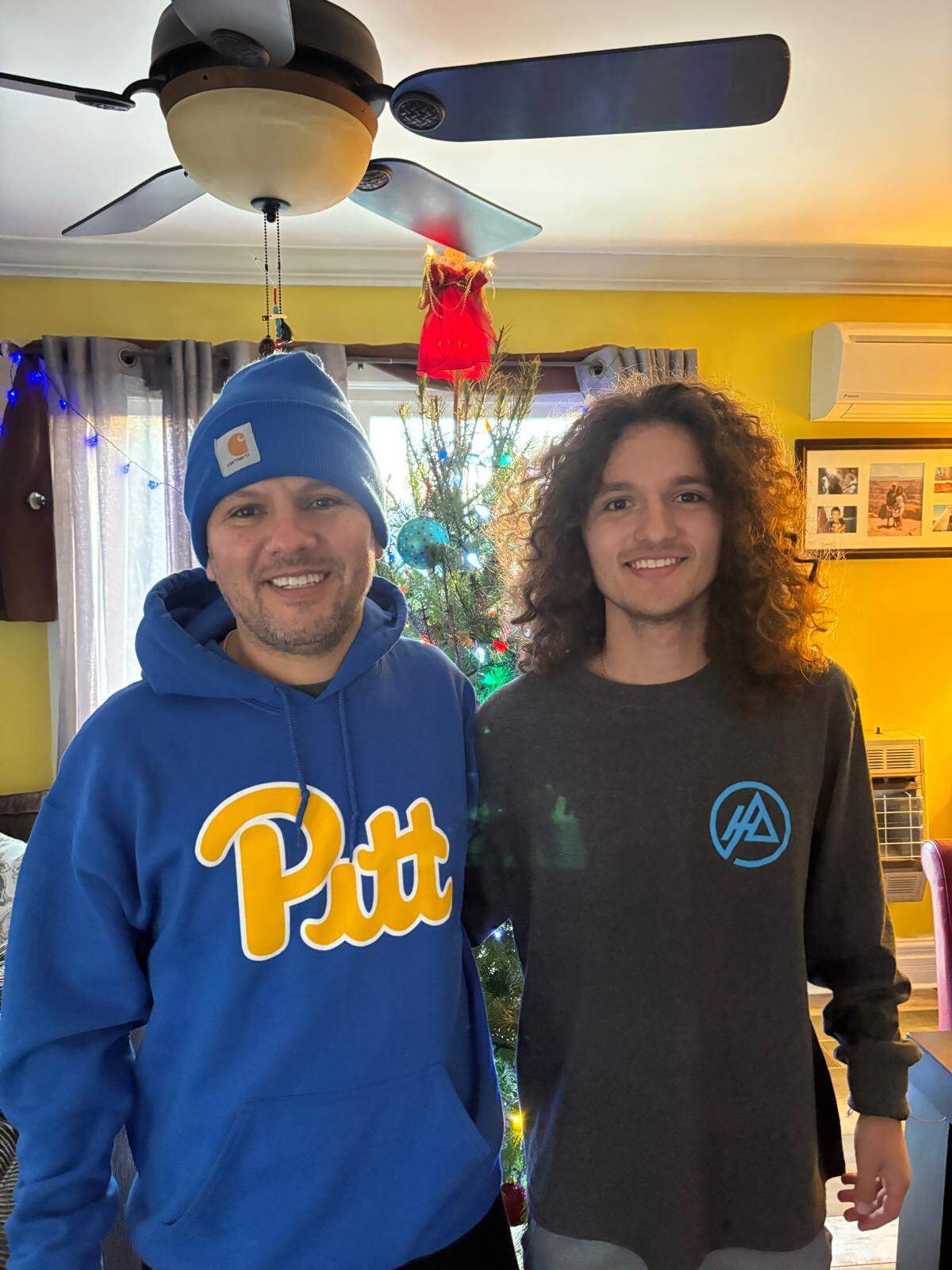Carlos and Alessandro in their home in Downingtown, Pennsylvania in 2024. 