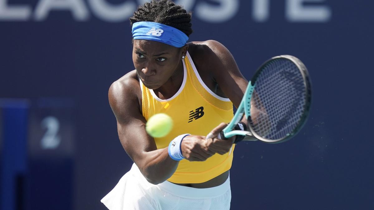 Cori Gauff returns the ball to Shuai Zhang of China, during the Miami Open tennis tournament, Sunday, March 27, 2022, in Miami Gardens, Fla. (AP Photo/Marta Lavandier)