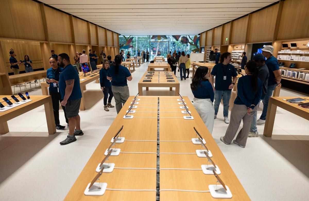 A general view of the inside of the new Apple Miami Worldcenter store during a media preview on Wednesday, Jan. 22, 2025, in downtown Miami, Fla. Apple is set to open its newest store in downtown Miami on Friday, featuring a dedicated pickup area and a biophilic garden.