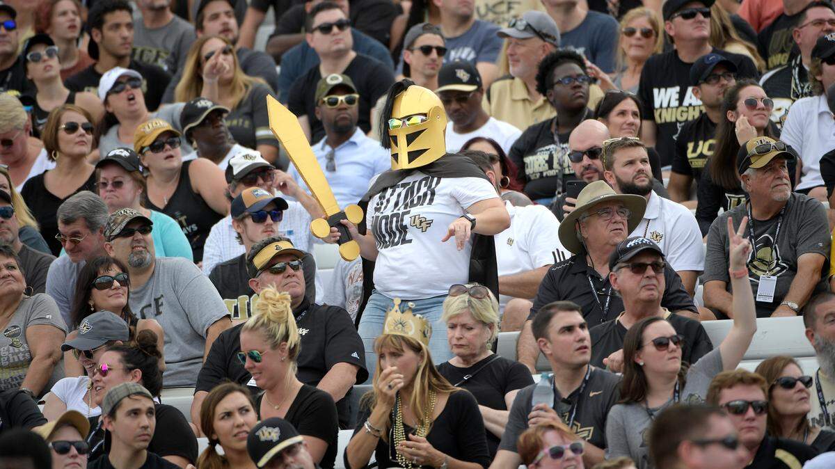 A Central Florida fan schemers in the stands during the second half of an NCAA college football game against Navy Saturday, Nov. 10, 2018, in Orlando, Fla. UCF won 35-24.