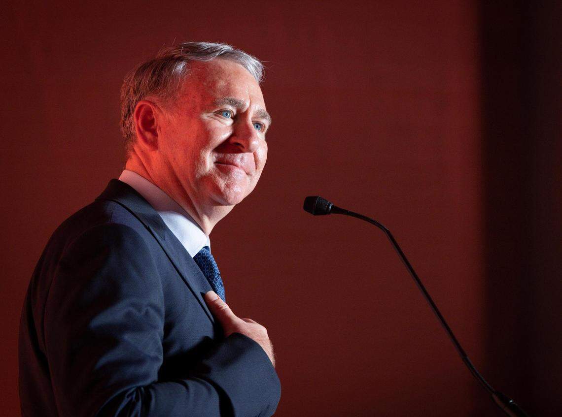 Ken Griffin, Citadel CEO, puts his hand over his heart while speaking during a ceremony celebrating his $50 million donation for a new building called the Kenneth C. Griffin Cancer Research Building on Tuesday, March 5, 2024, at University of Miami Miller School of Medicine in Miami.