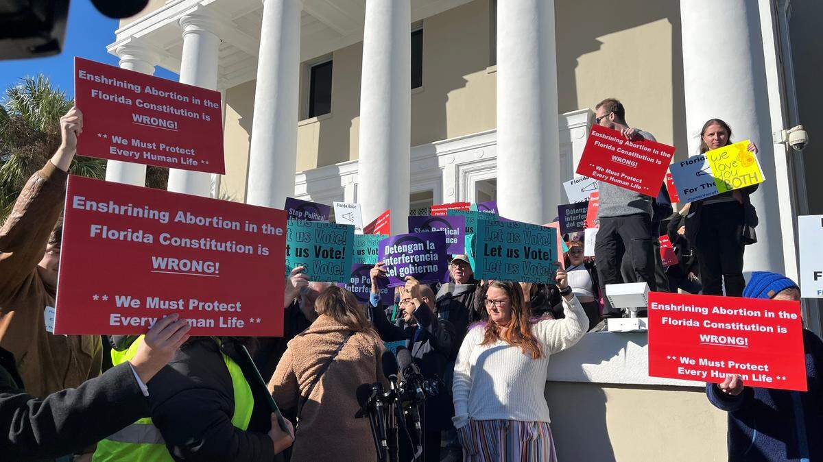 People gathered outside the Florida Supreme Court on Feb. 7 before a hearing over a proposed constitutional amendment on the November 2024 ballot to restore broader access to abortion in the state.