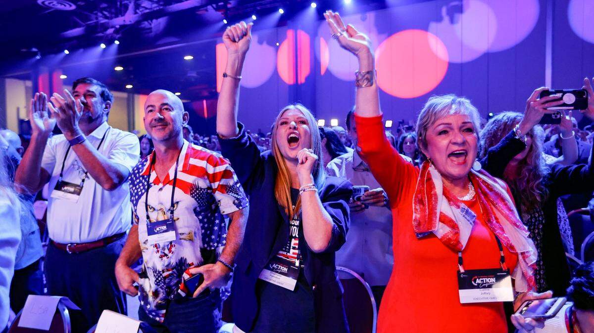 Marty Bergin, Patrick Hamilton, Stephanie Hamilton and Cathie Joffary, left to right, in the audience during the Turning Point Action Conference at the Palm Beach County Convention Center in West Palm Beach, Florida, on Saturday, July 15, 2023.