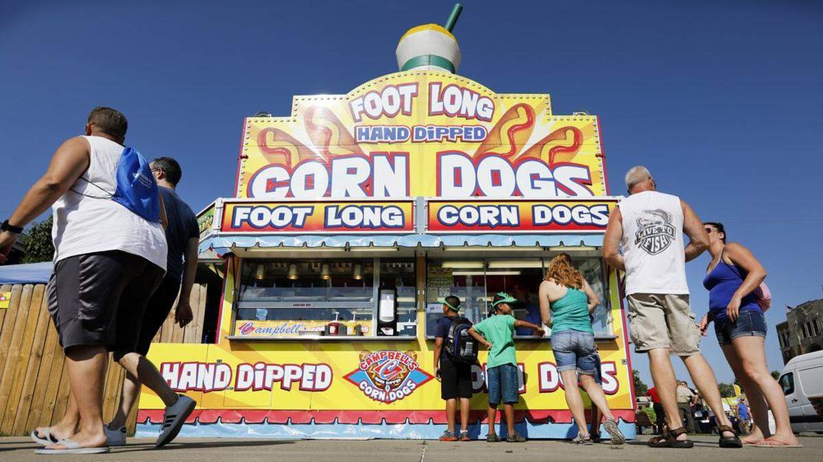 For anyone who wants to be president, showing up at the Iowa State Fair to eat a corndog is a must.