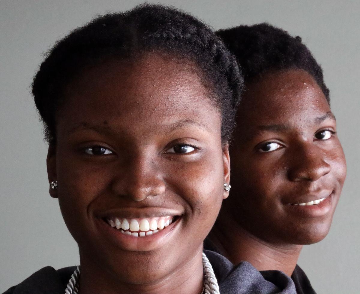 Miami Central students Kalida Gawon, 16, and twin brother, Kalid Gawon, right, have been awarded a combined $1.4 million in scholarships as the Nigerian twins plan to attend college in the fall. They were photographed at the campus of Miami Central High School in Miami on Tuesday, April 30, 2019.
