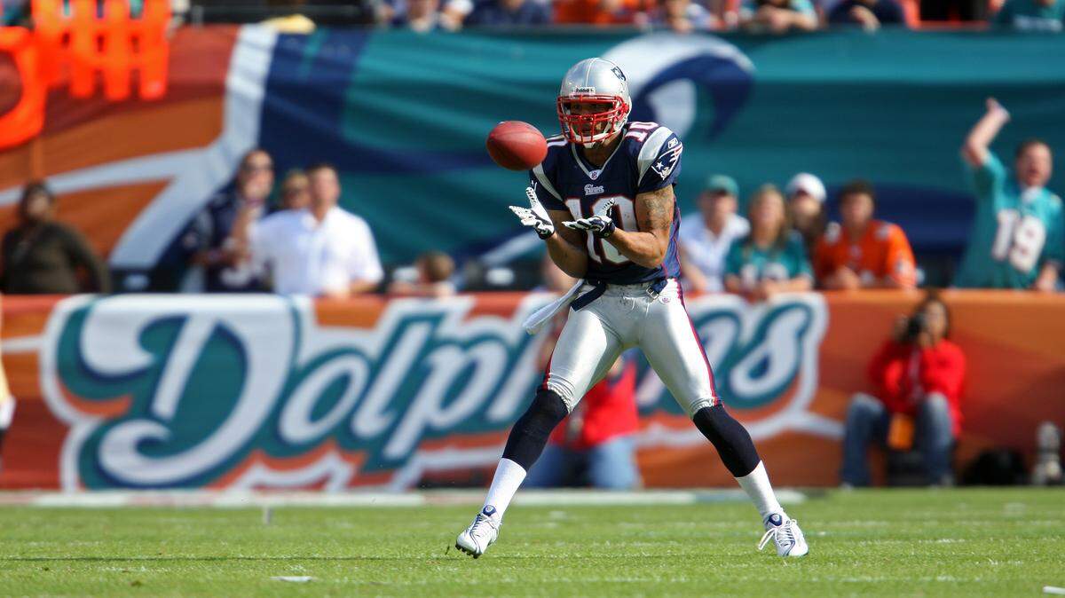 In this Nov. 23, 2008 file photo, New England Patriots receiver Jabar Gaffney catches a pass against the Miami Dolphins.