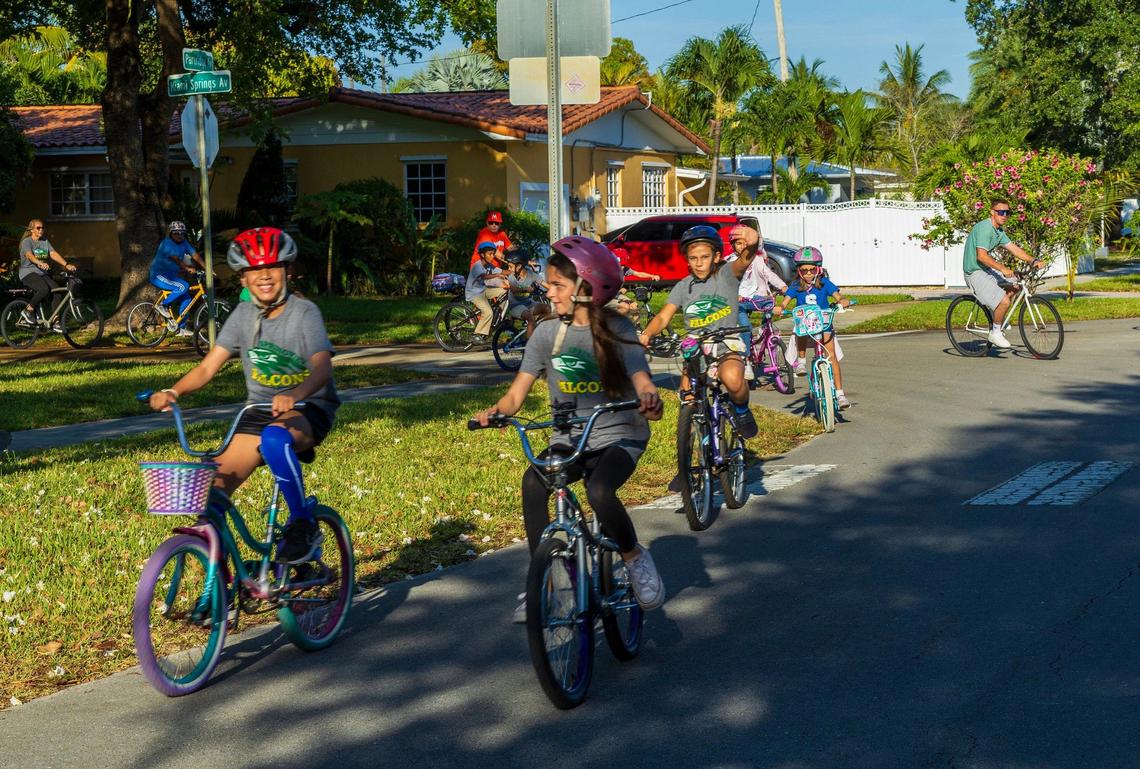Students at Springview Elementary School in Miami Springs ride to school on Friday, May 24, 2024, as part of of The Springview Bike Bus. Parents and teachers ride with them.