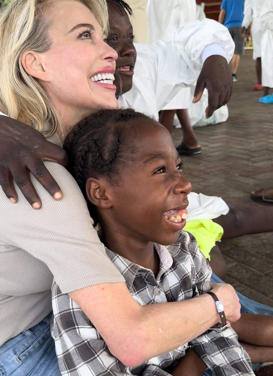 Susie Krabacher, the founder of HaitiChildren orphanage, is all smiles on Thursday, March 21, 2024 after welcoming 59 disabled Haitian children to Port Antonio, Jamaica to begin a new life. Krabacher and her husband Joe of Colorado led a months-long fight to have the children, housed at their orphanage north of Port-au-Prince, safely relocated.