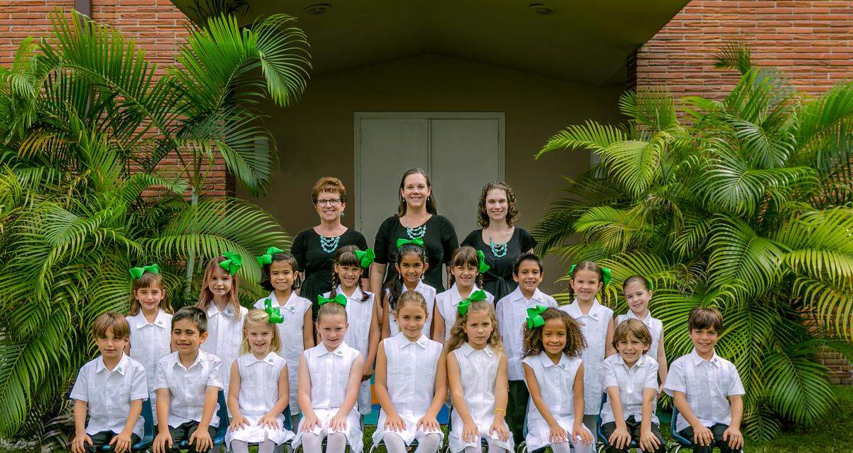 South Florida Music directors Joy Galliford, Karen Flanary and Alaina Lorenzo celebrate with young musicians in the Piano Year 2 Performance Group who were selected to perform at Walt Disney World for the fourth year in a row.