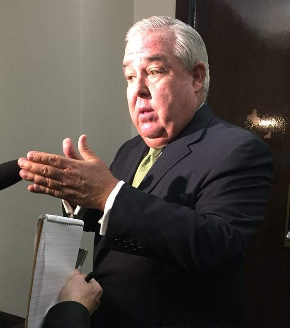 Orlando attorney John Morgan spoke to reporters before the trial Wednesday against the state challenging the law that prohibits smoking as a form of medical marijuana. He financed the campaign to make medical marijuana a constitutional right and is backing the lawsuit.