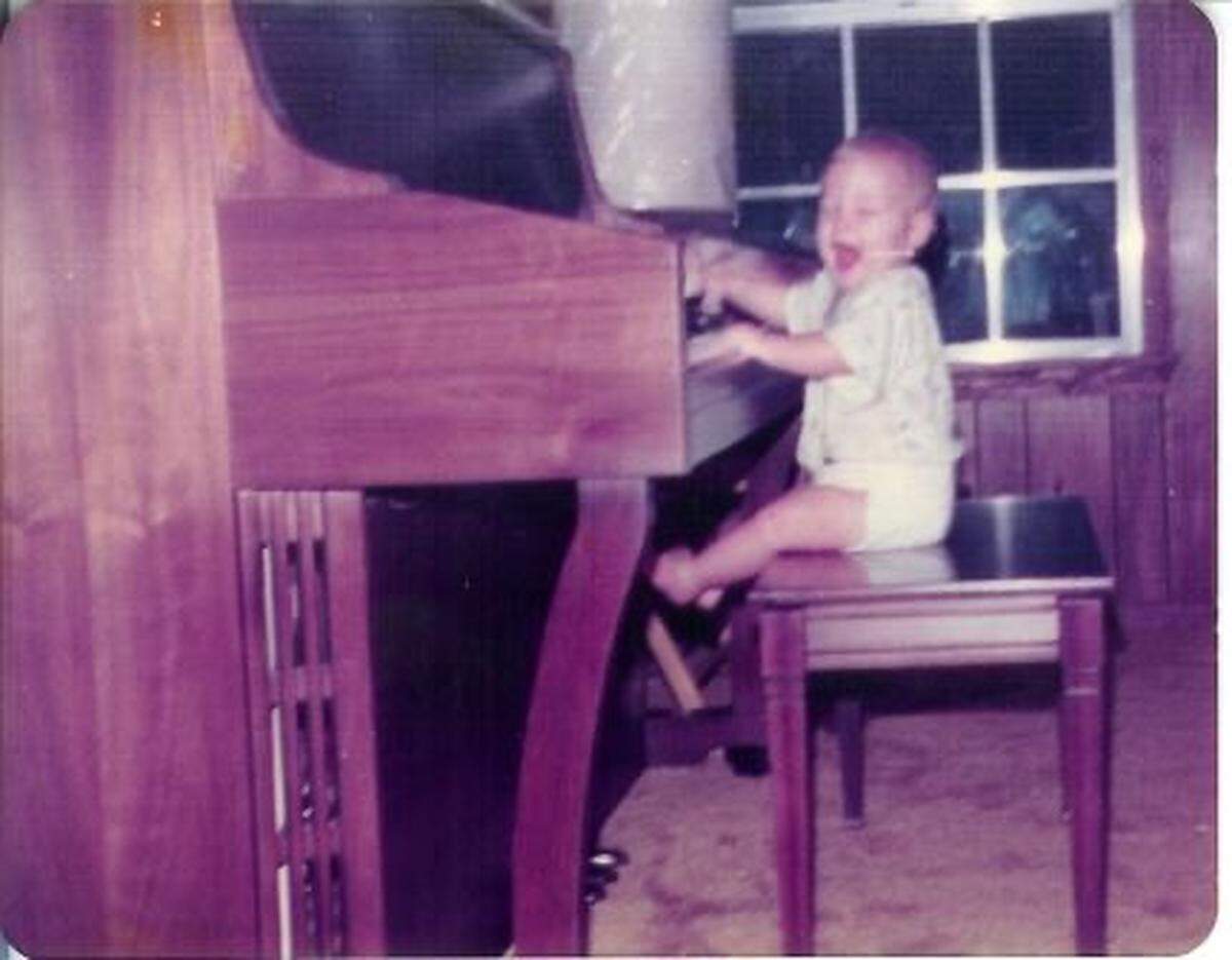 Joy Harden, shown here as an 8-month-old baby, learned to play the piano early from her mother.