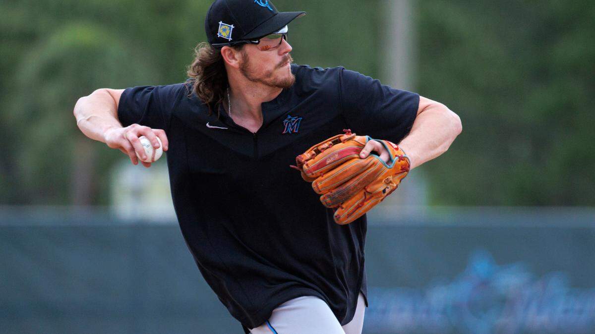 Miami Marlins third baseman Brian Anderson runs drills during their spring training workout at Roger Dean Stadium on Tuesday, March 15, 2022 in Jupiter, FL.