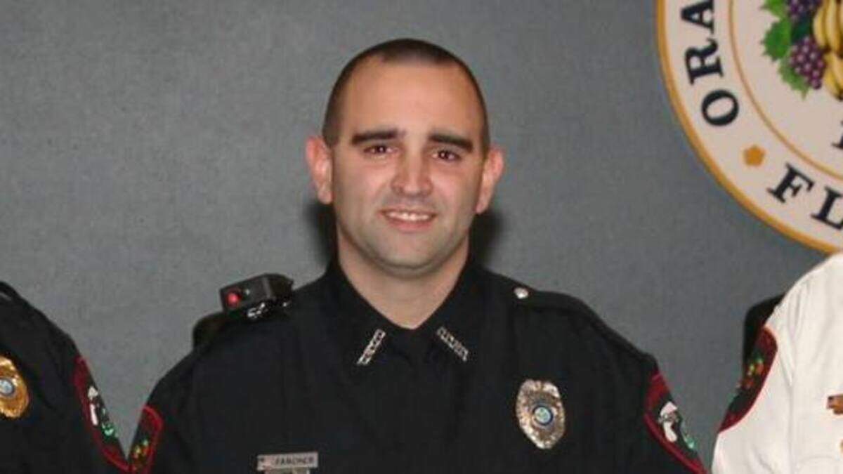 Joshua Fancher after being sworn in as an Orange City police officer on Dec. 21.
