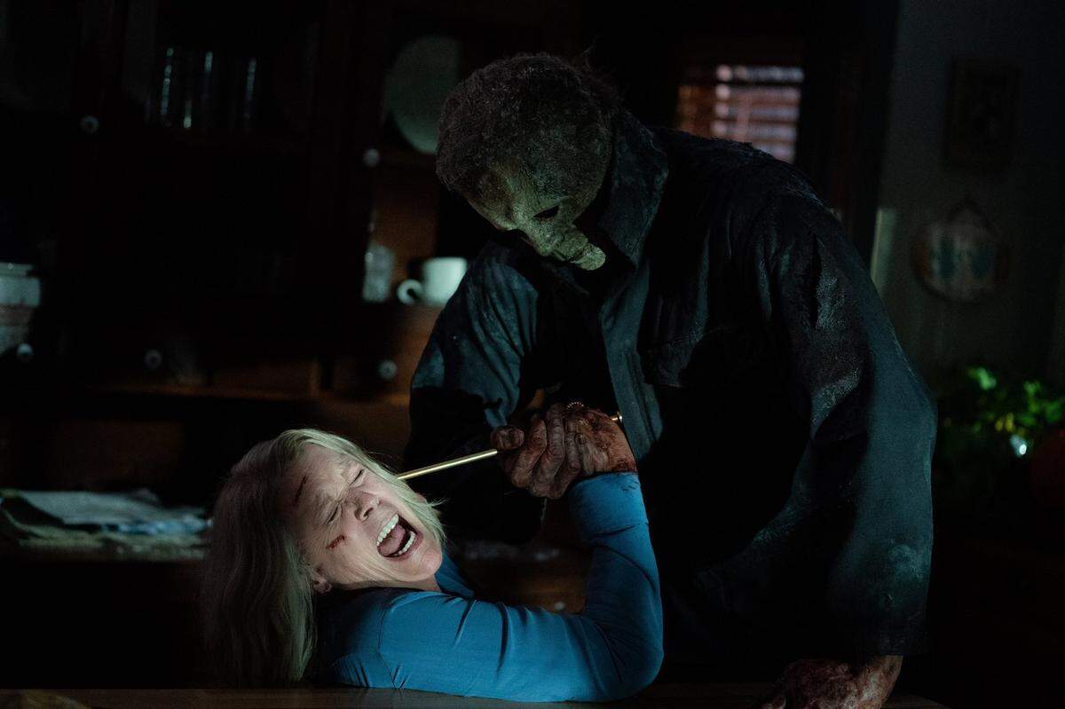 Jamie Lee Curtis, left, as Laurie Strode and Michael Myers (aka The Shape) in “Halloween Ends.” (Ryan Green/Universal Pictures/TNS)