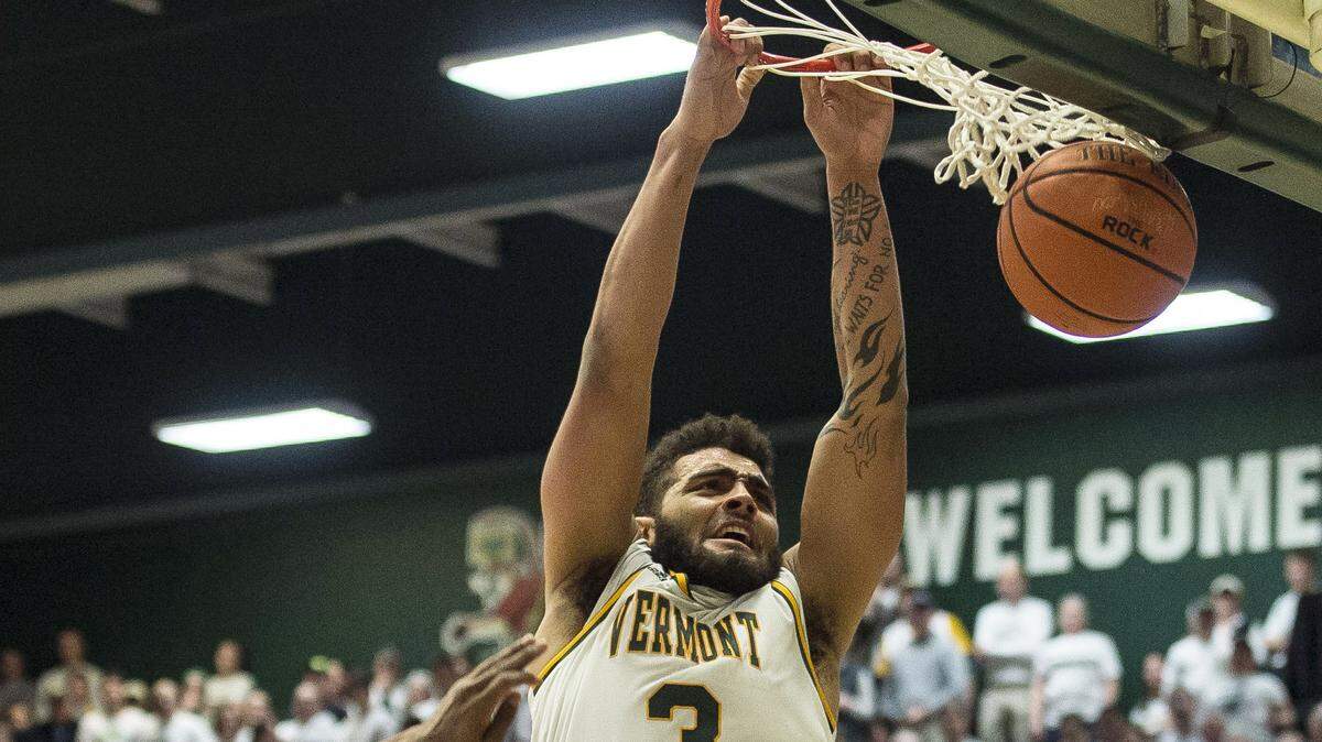 Vermont’s Anthony Lamb (3) dunks over Maryland-Baltimore County’s K.J. Jackson (3) during NCAA college basketball game in the championship of the America East Tournament, Saturday, March 16, 2019, in in Burlington, Vt.