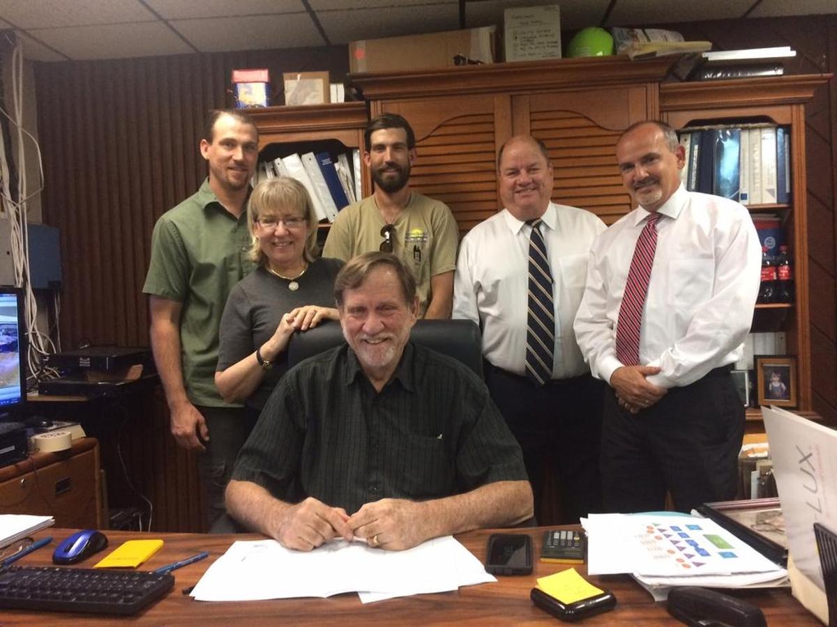 Miami Awning company executives, from left: Joseph Reilly, production manager; Joan Reilly Garvey, secretary/treasurer and sales manager; Daniel Reilly (standing), installations manager; Michael Reilly (sitting), owner, CEO and president; Bill Garvey, vice president, and Gustavo Rotella, vice president. They are at the company’s headquarters at 3905 N.W. 31st Ave., Miami.