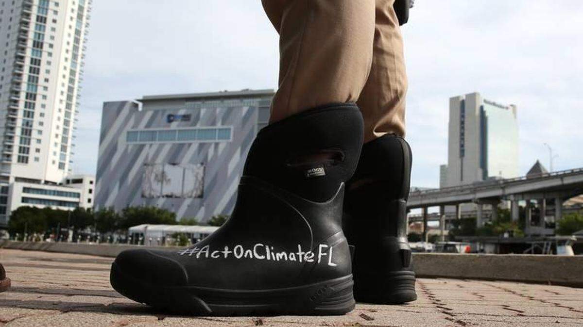 State Sen. José Javier Rodríguez, of Miami, has made climate change a priority in the Florida Legislature, wearing these boots on the Senate floor.