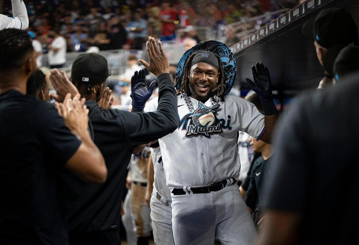 Miami Marlins designated hitter Josh Bell (9) celebrates his homer, the third home run in a row for the Marlines, during the eight inning of a baseball game on Monday, Aug. 14, 2023, at loanDepot Park in Miami.