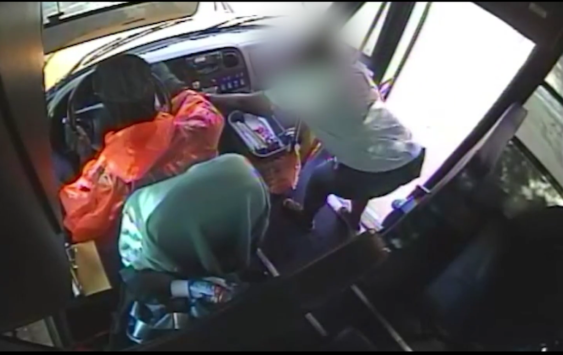 This is the moment the bus attendant reached over and locked the brakes before getting off the bus.