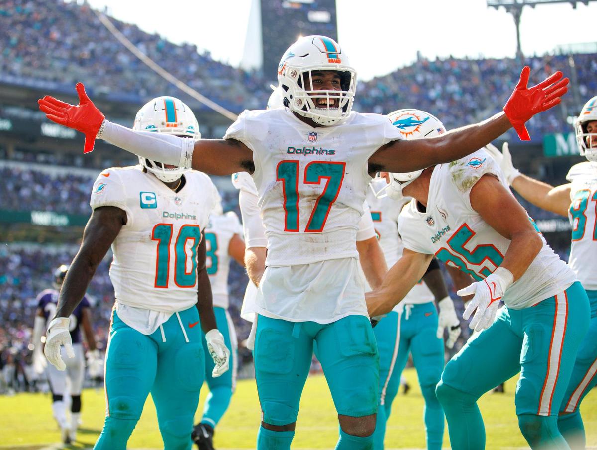 Miami Dolphins wide receiver Jaylen Waddle (17) celebrates with teammates after scoring the go ahead touchdown during fourth quarter of an NFL football game against the Baltimore Ravens at M&T Bank Stadium on Sunday, September 18, 2022 in Baltimore, MD.