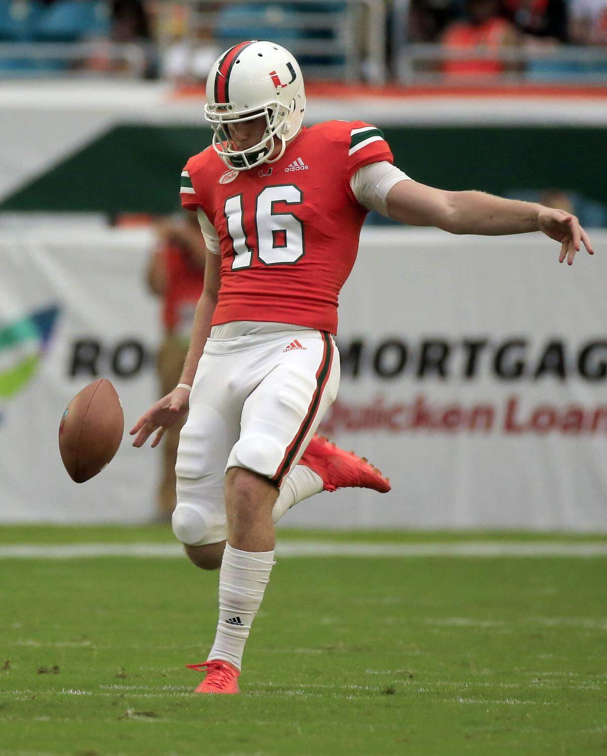 Miami Hurricanes punter Zach Feagles (16) kicks in the first half as the Miami Hurricanes hosts the Pittsburg Panthers at Hard Rock Stadium in Miami Gardens on Saturday, November 24, 2018.