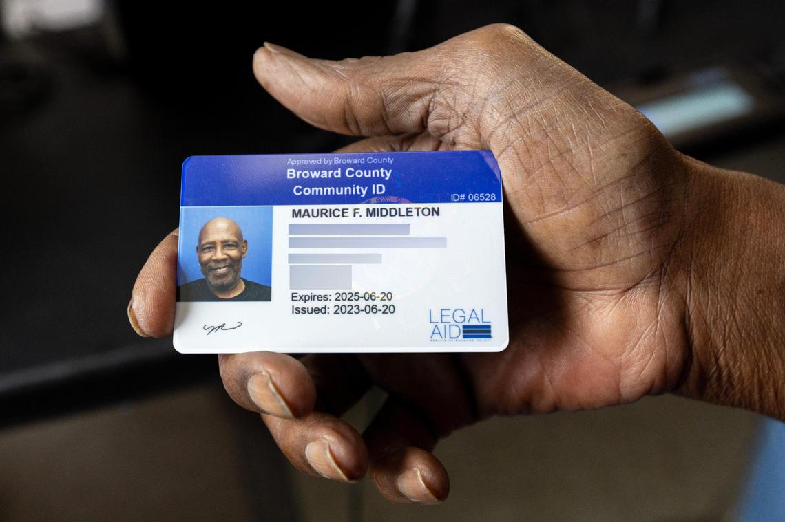 Pompano Beach resident Maurice F. Middleton, 68, holds his new Broward County ID card during a community ID event hosted by Legal Aid Service of Broward County in partnership with Salvation Army in Fort Lauderdale, Florida, on Friday, August 18, 2023.
