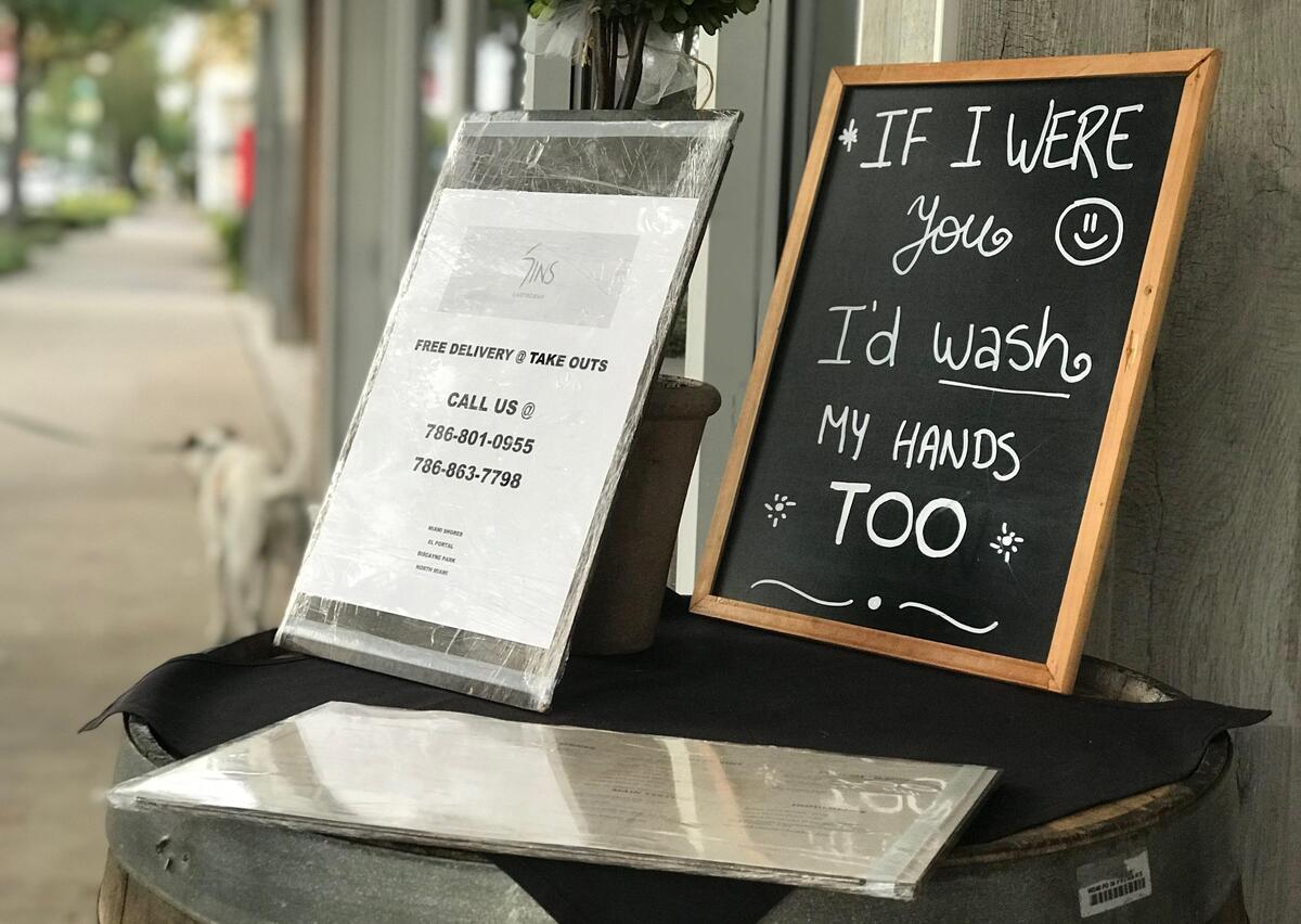 Sins Gastropub in Miami Shores has a chalkboard sign outside reminding visitors to wash their hands during the coronavirus pandemic. The restaurant, which opened in downtown Miami Shores in October 2019, is offering takeout service and has free delivery to Miami Shores, El Portal, Biscayne Park and North Miami during the coronavirus pandemic.