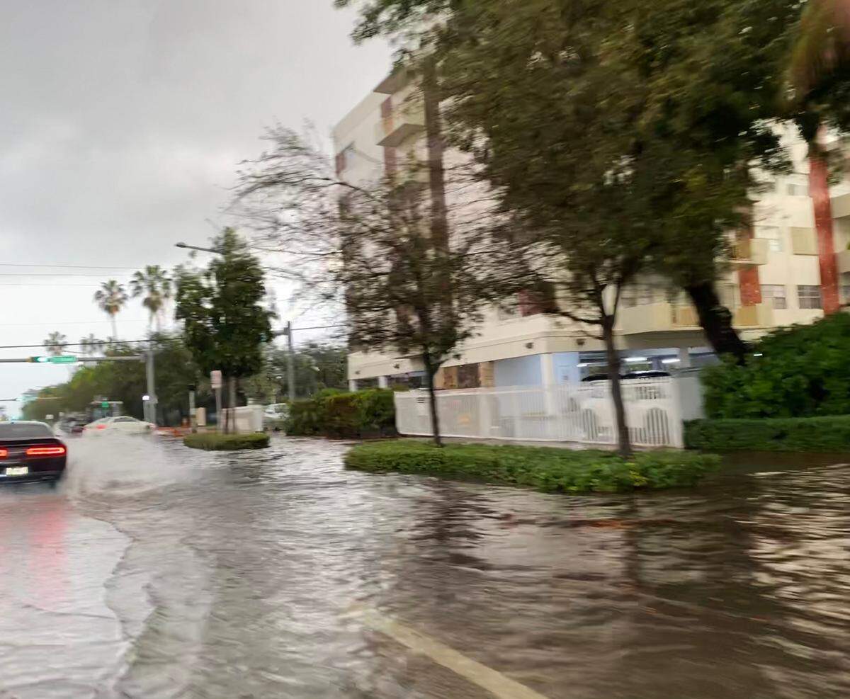 A sudden deluge turned this stretch of Alton Road in Miami Beach, near 11th Street, into a near-river on Tuesday afternoon.