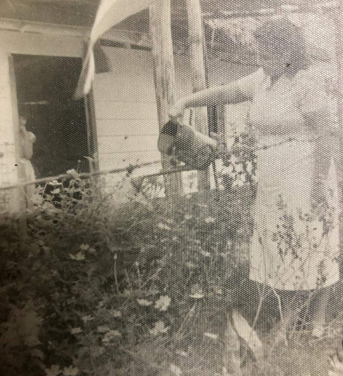 In early 1950s pre-Castro Cuba, teacher Olga Ruiz tends to the garden in front of a one-room school house in the countryside. She drove a Jeep and rode a horse to get there. Service in the country was a must to earn a spot in a city school.
