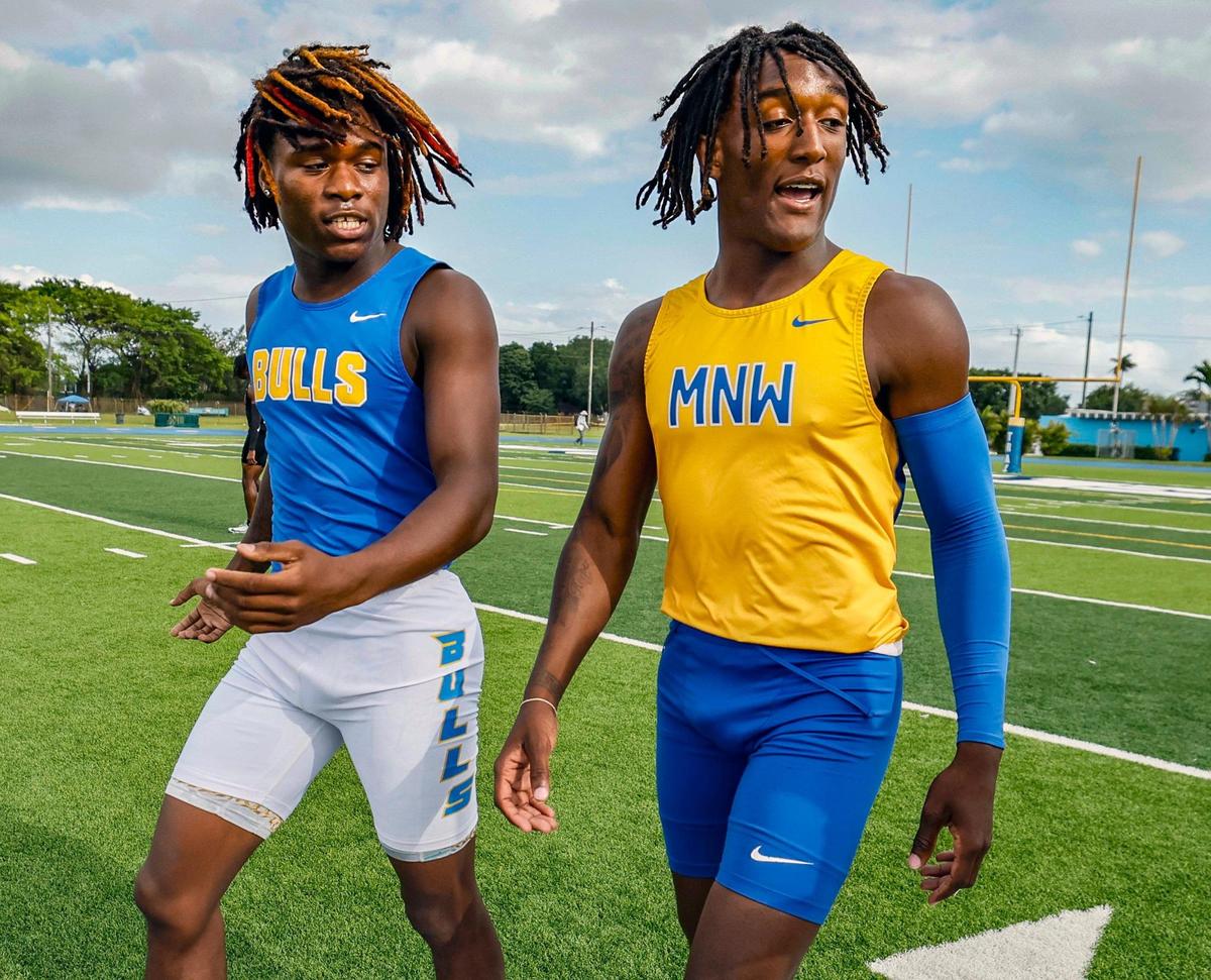 J’Vari Flowers and Tywan Cox after running the 200 meter race during GMAC Track and Field Finals at Traz Powell Stadium in Miami, Florida on Thursday, April 10, 2025.