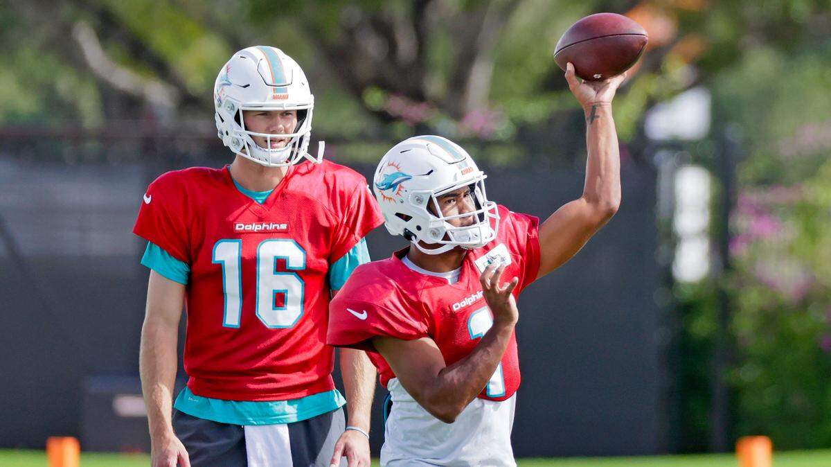 Miami Dolphins quarterback Tua Tagovailoa (1) sets up to pass as teammate Jake Dolegala (16) looks on during practice at Baptist Health Training Complex in Hard Rock Stadium on Wednesday, November 3, 2021 in Miami Gardens, Florida, in preparation for their game against the Houston Texans at Hard Rock Stadium on Sunday.