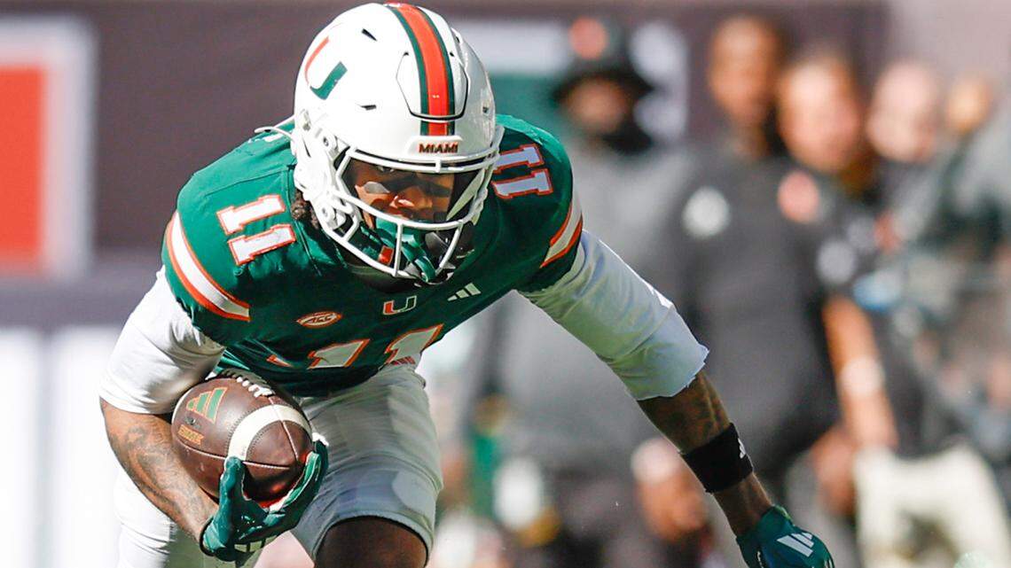 Miami Hurricanes wide receiver Sam Brown Jr. (11) on a reception against the Wake Forest Demon Deacons in the first half of their NCAA game in Miami Gardens, Florida, on Saturday, November 23, 2024.