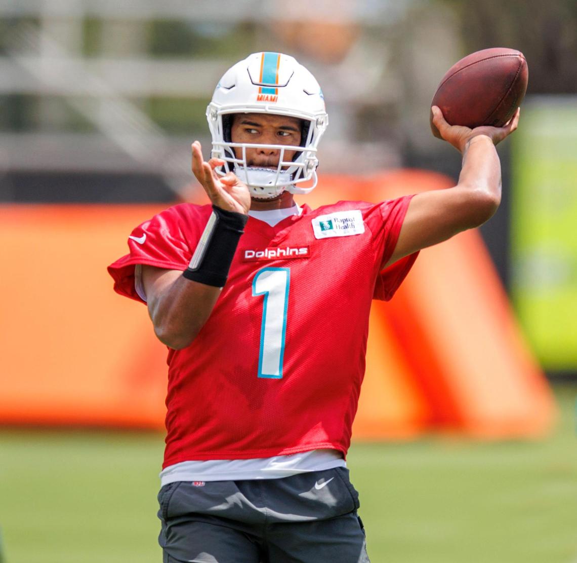 Miami Dolphins quarterback Tua Tagovailoa (1) sets up to pass during NFL football training camp at Baptist Health Training Complex in Hard Rock Stadium on Thursday, September 1, 2022 in Miami Gardens, Florida.