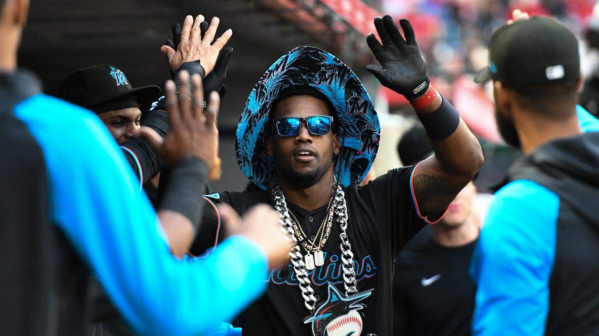 Miami Marlins designated hitter Jorge Soler (12) celebrates with teammates in the dugout after hitting a home run against the Los Angeles Angels during the third inning at Angel Stadium on Friday, May 26, 2023.