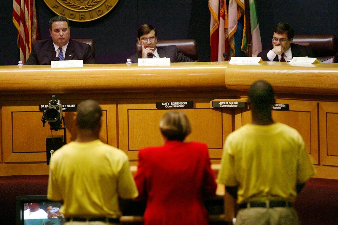 Two cellmates of Omar Paisley, a teen who died in a juvenile detention facility from a ruptured appendix, spoke in September 2003 before a House committee on juvenile justice that met in the Miami-Dade Commission chambers. On the dais were, from left, Chairman Rep. Gus Barreiro, staff member David De La Paz and Rep. Gus Bilirakis. Barreiro, a champion of vulnerable children, died of a heart attack Friday morning, August 16, 2019.