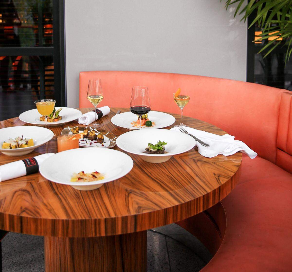 One of the outdoor banquettes at L’Atelier de Joel Robuchon in Miami’s Design District.