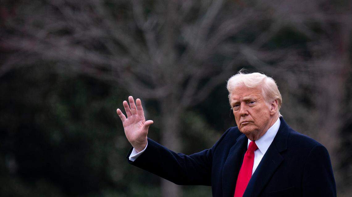President Donald Trump walks on the South Lawn of the White House before boarding Marine One in Washington on March 14.